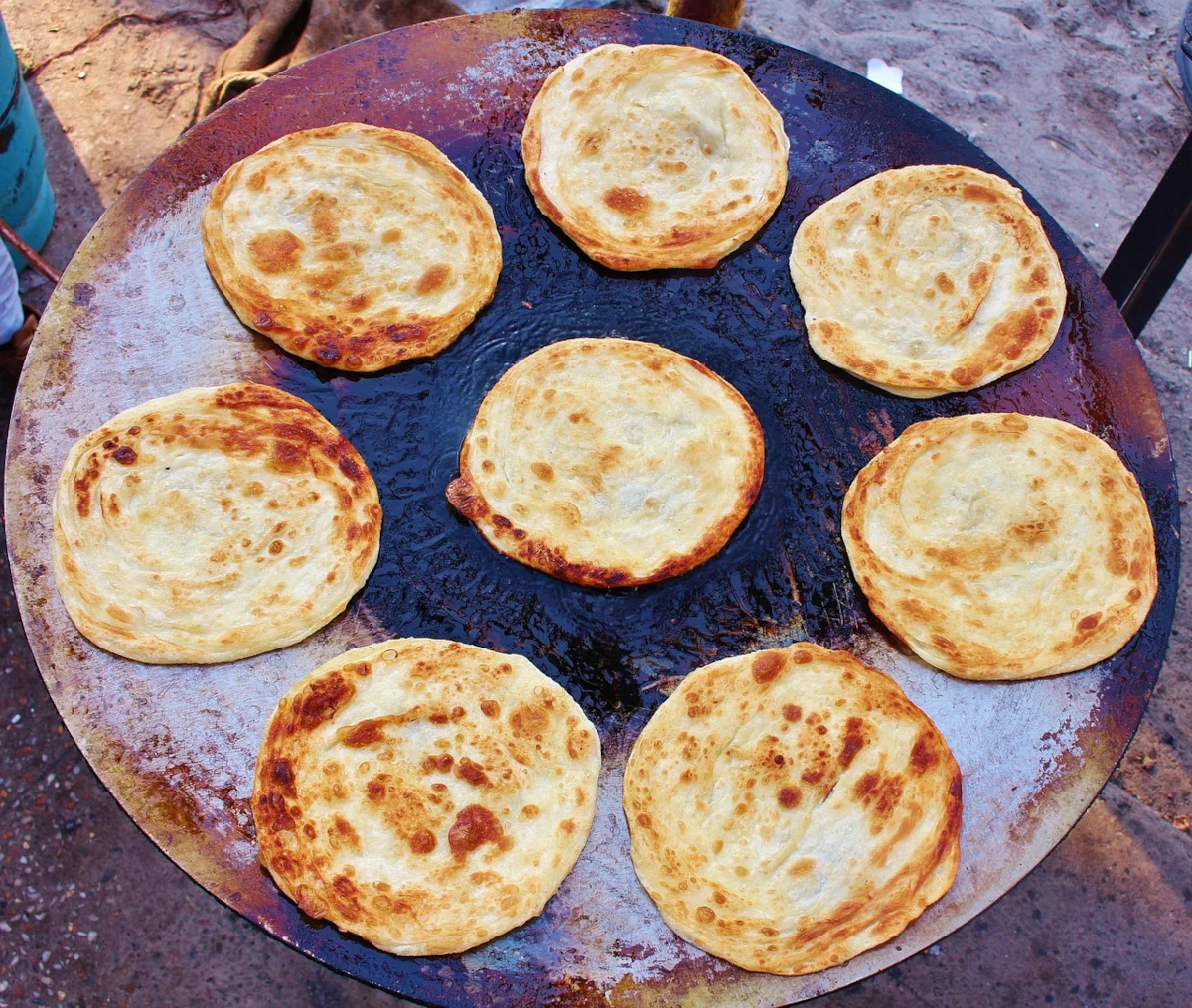 9 Bitter Gourd Benefits: Nutrition, Health Uses, and Side Effects 2 paratha on wooden tray